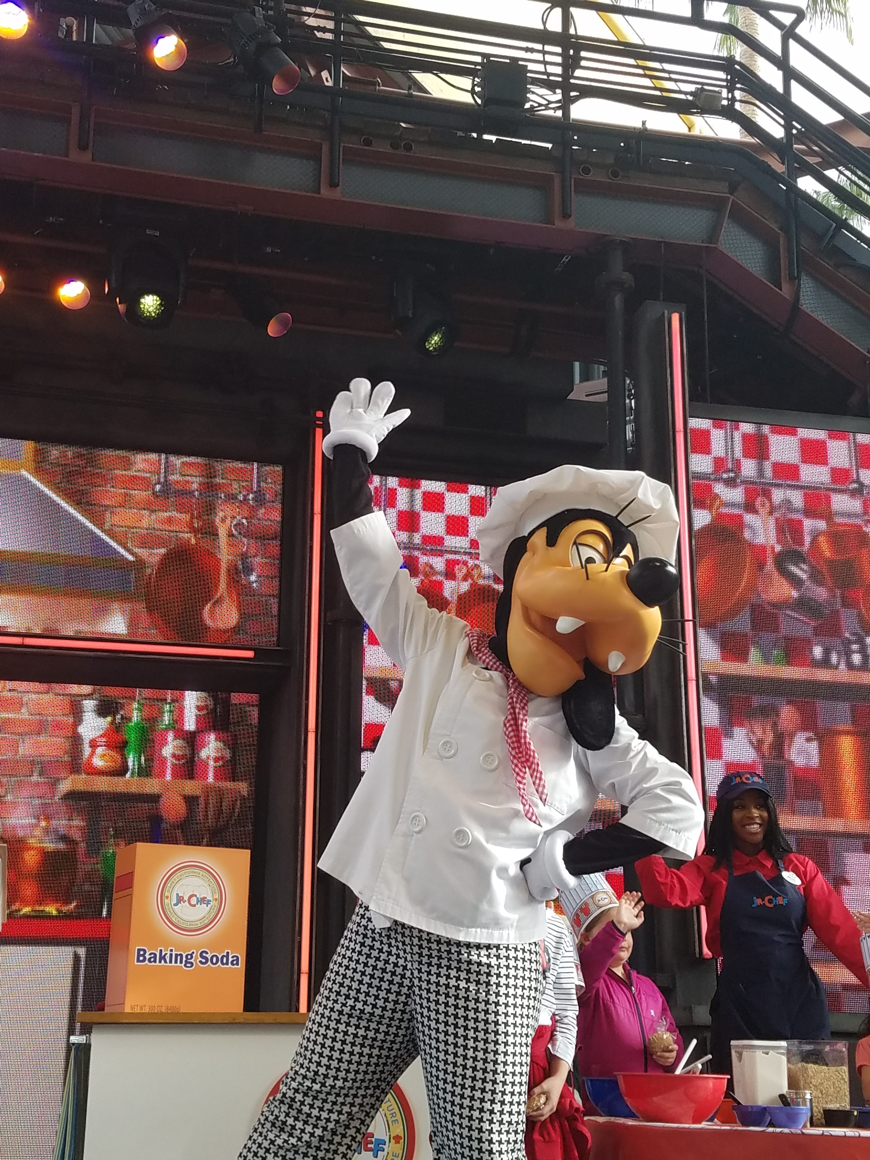 chef goofy works with kids at the Food and Wine Festival in DCA