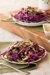 Purple Cabbage and Shaved Asparagus Slaw with Cumin-Sesame Dressing