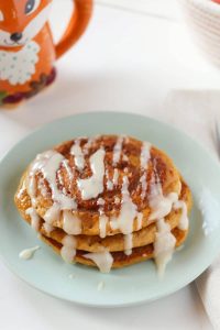 Cinnamon Swirl Pumpkin Spice Pancakes with Cream Cheese Glaz