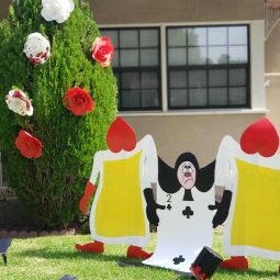 paining the roses red lawn display alice in wonderland halloween