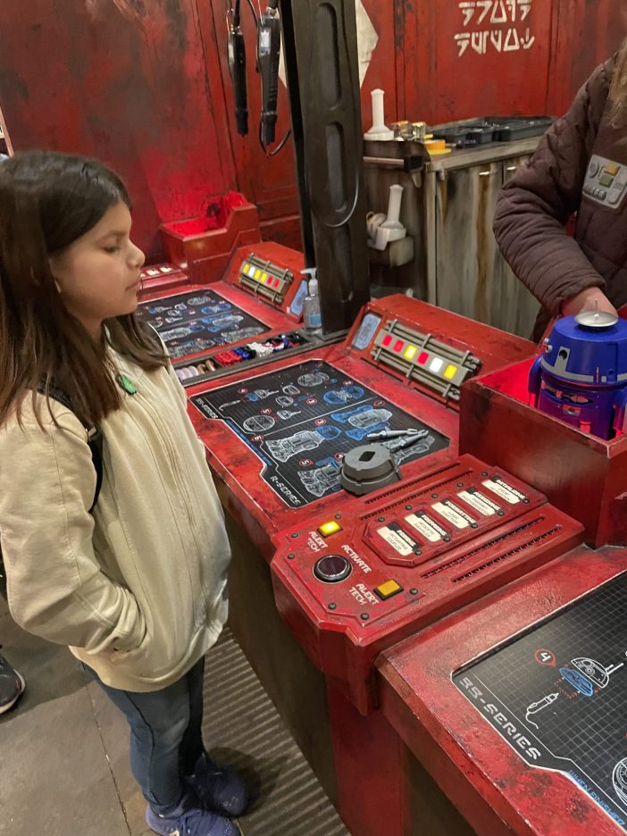 Building a droid with instructions at Disneyland