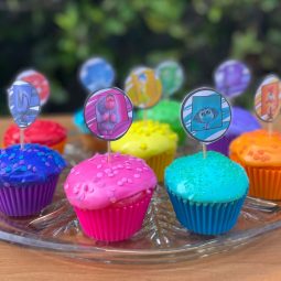 frosted cupcakes with Inside Out toppers